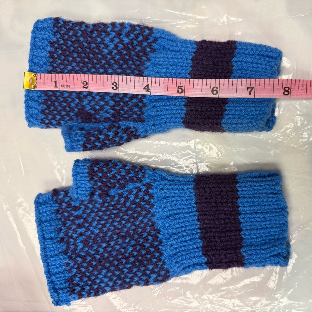 Home made by my mom. 
Blue Knit Fingerless Gloves